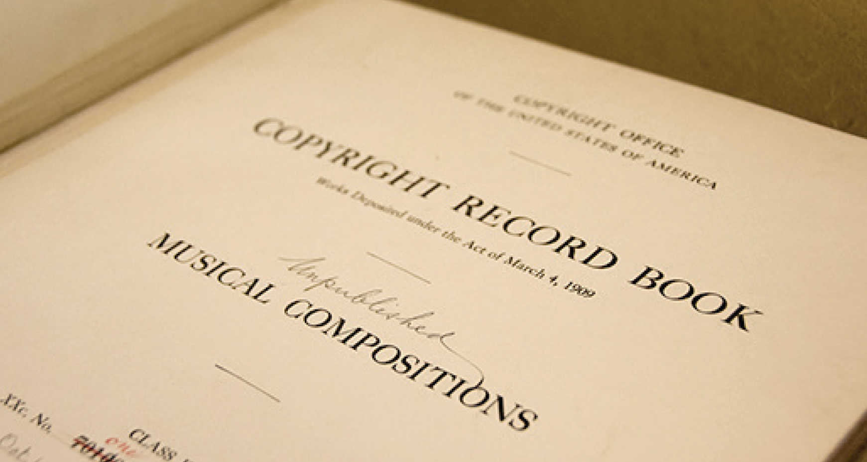 Historical copyright record book open; title page